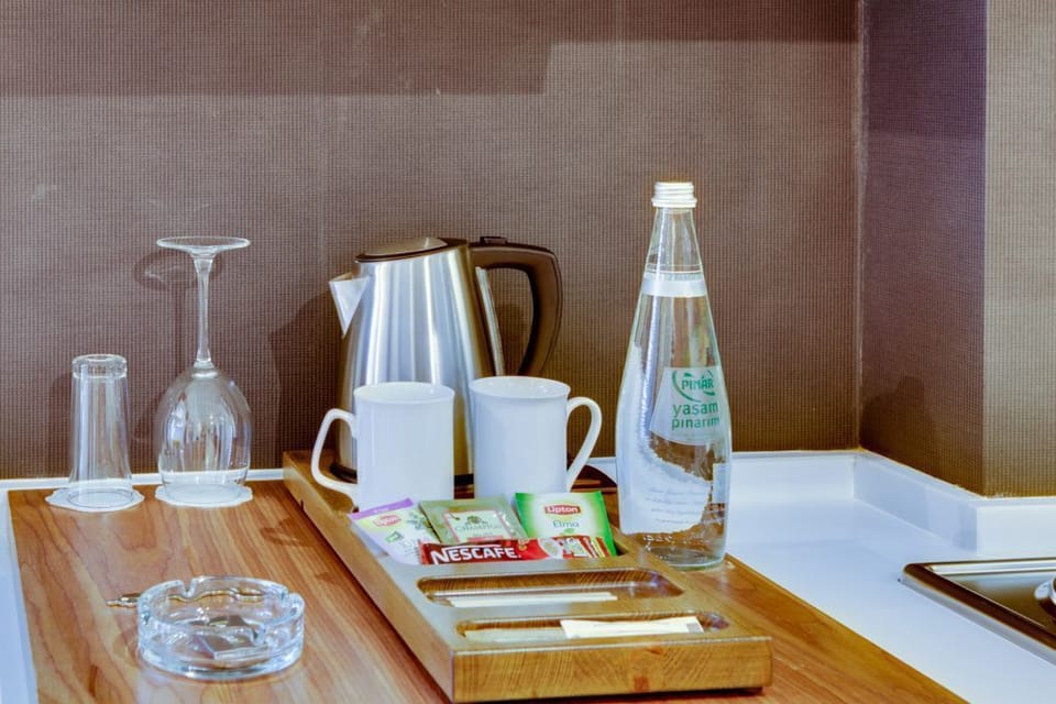 Suite, Balcony | Coffee and/or coffee maker
