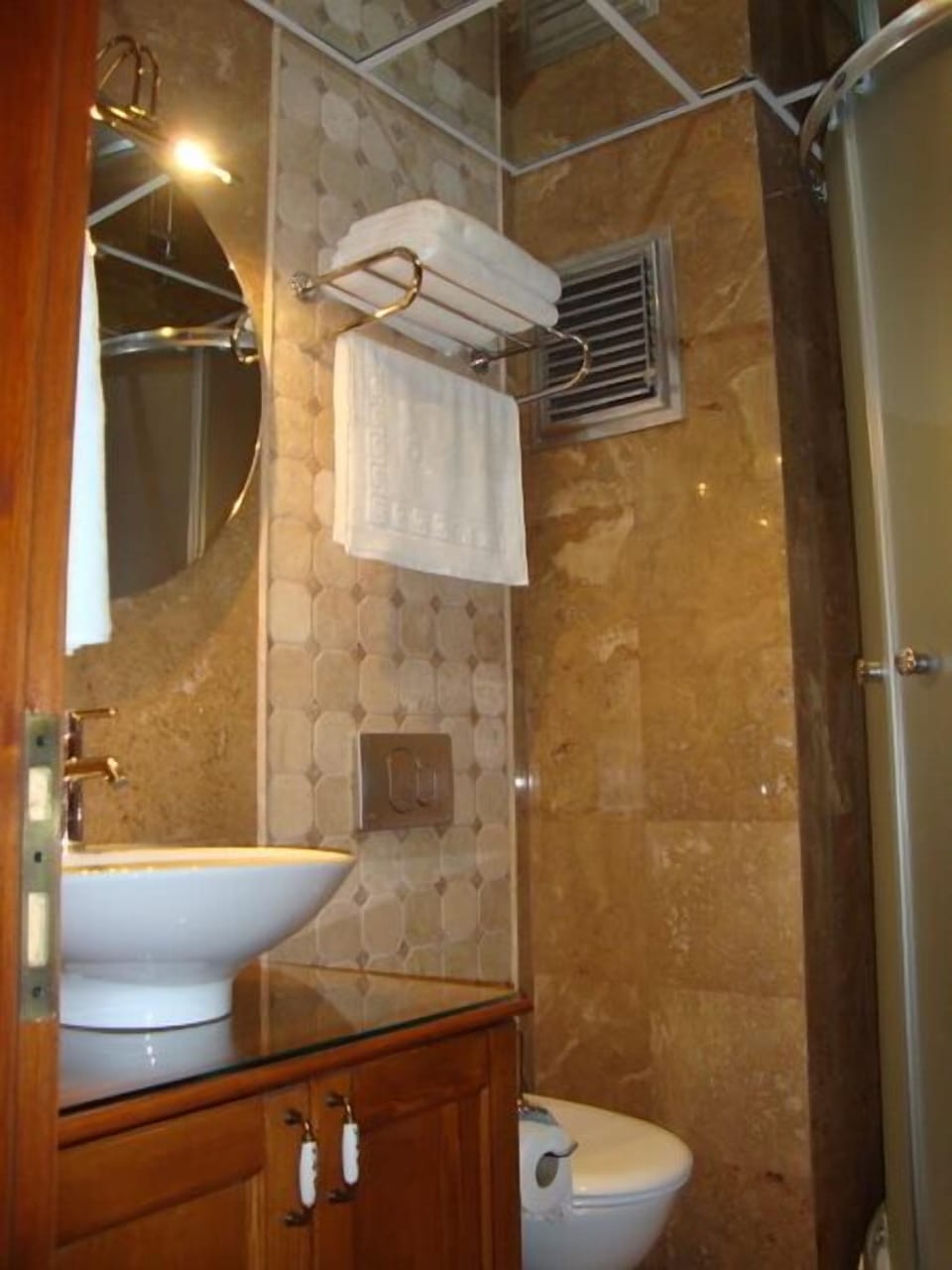 Shower, free toiletries, hair dryer, slippers