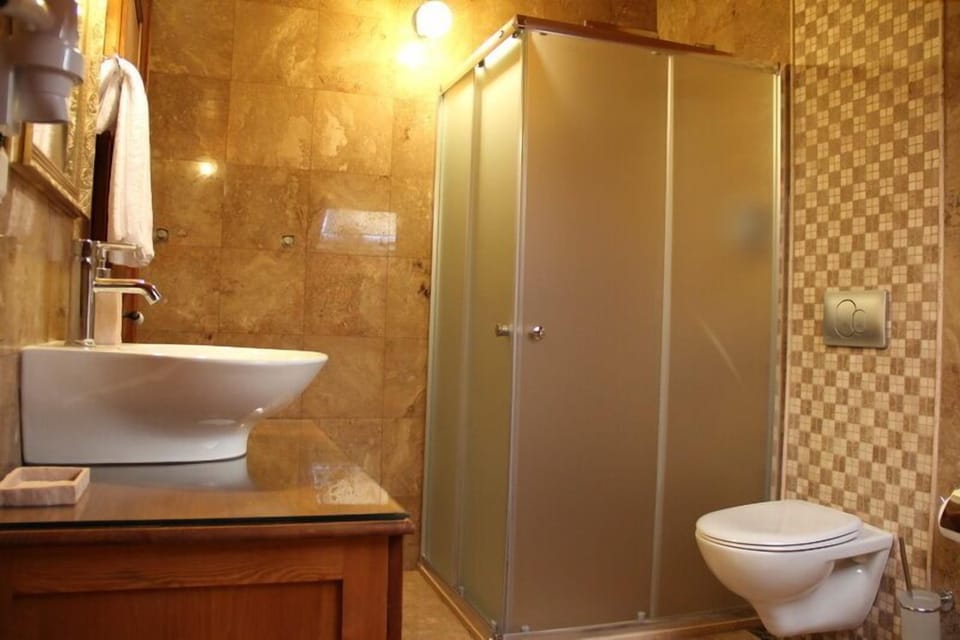 Shower, free toiletries, hair dryer, slippers
