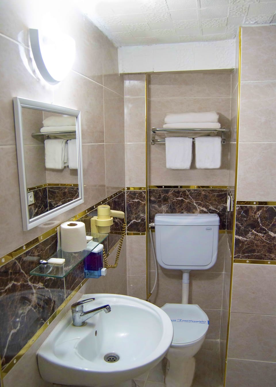 Shower, free toiletries, hair dryer, slippers