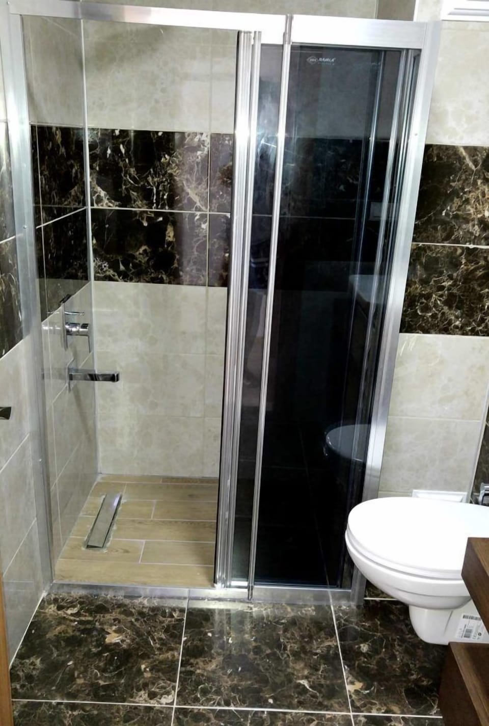 Shower, free toiletries, hair dryer, slippers