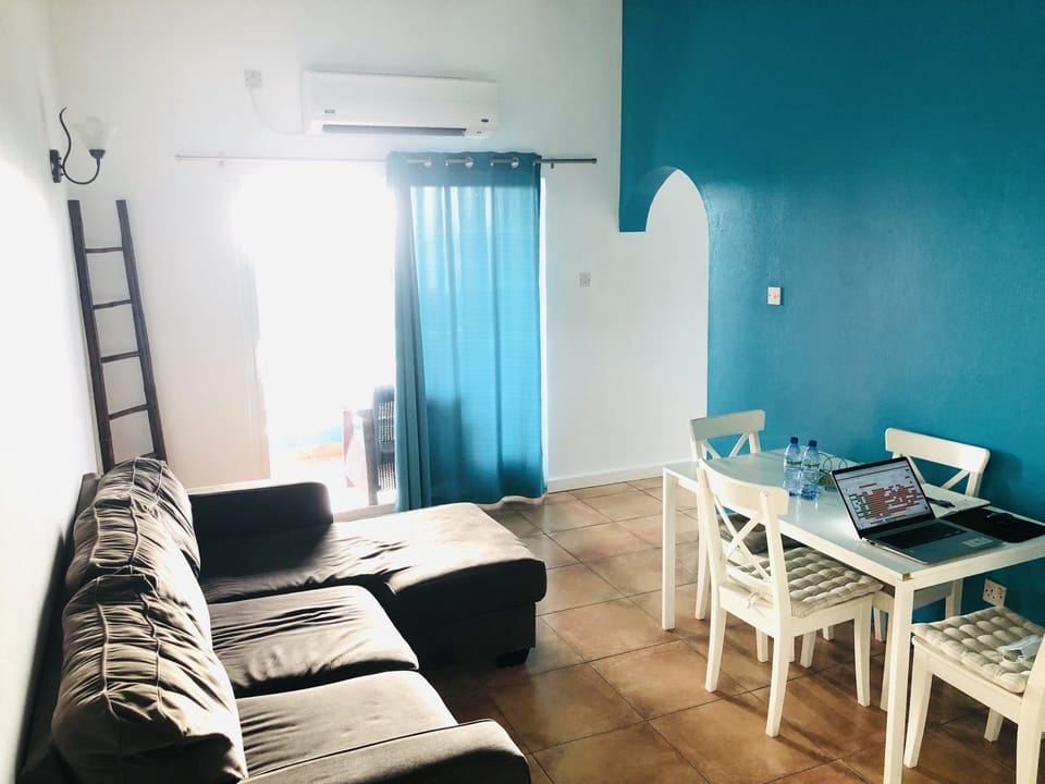 Apartment, 2 Bedrooms, Kitchen, Sea View | Living room | 36-inch flat-screen TV with cable channels