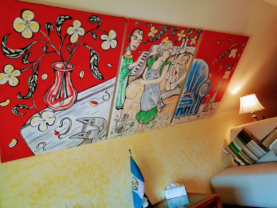 Guatemalan Getaway Loft | Living room | 32-inch flat-screen TV with satellite channels, TV
