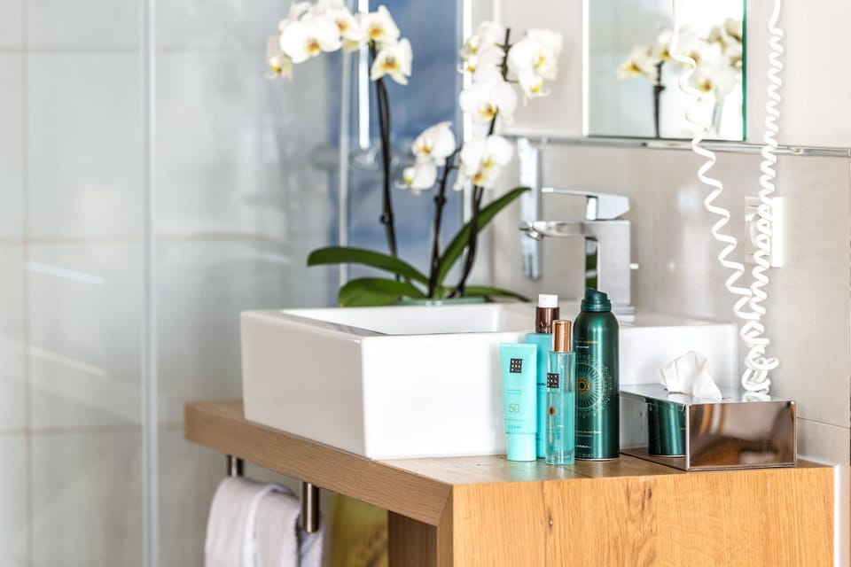 Shower, free toiletries, hair dryer, bathrobes