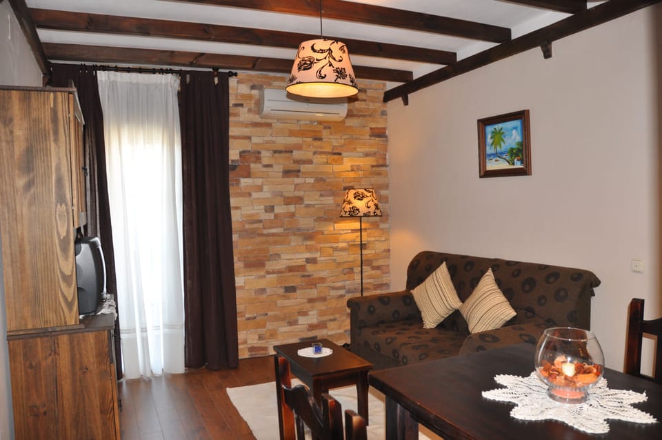 Apartment, 2 Bedrooms | Living room | Flat-screen TV, DVD player
