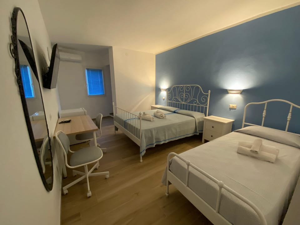 Superior Quadruple Room | Premium bedding, minibar, desk, soundproofing