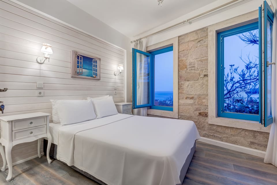 Double Room, Sea View, Ground Floor | Minibar, in-room safe, soundproofing, free WiFi