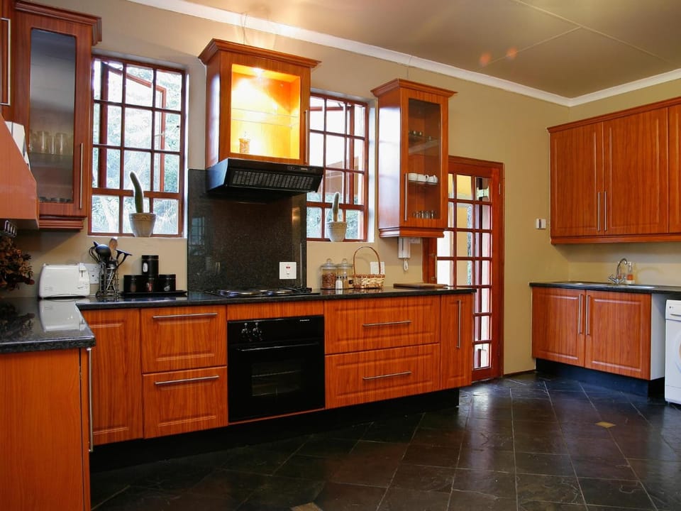 Fridge, microwave, coffee/tea maker, cookware/dishes/utensils