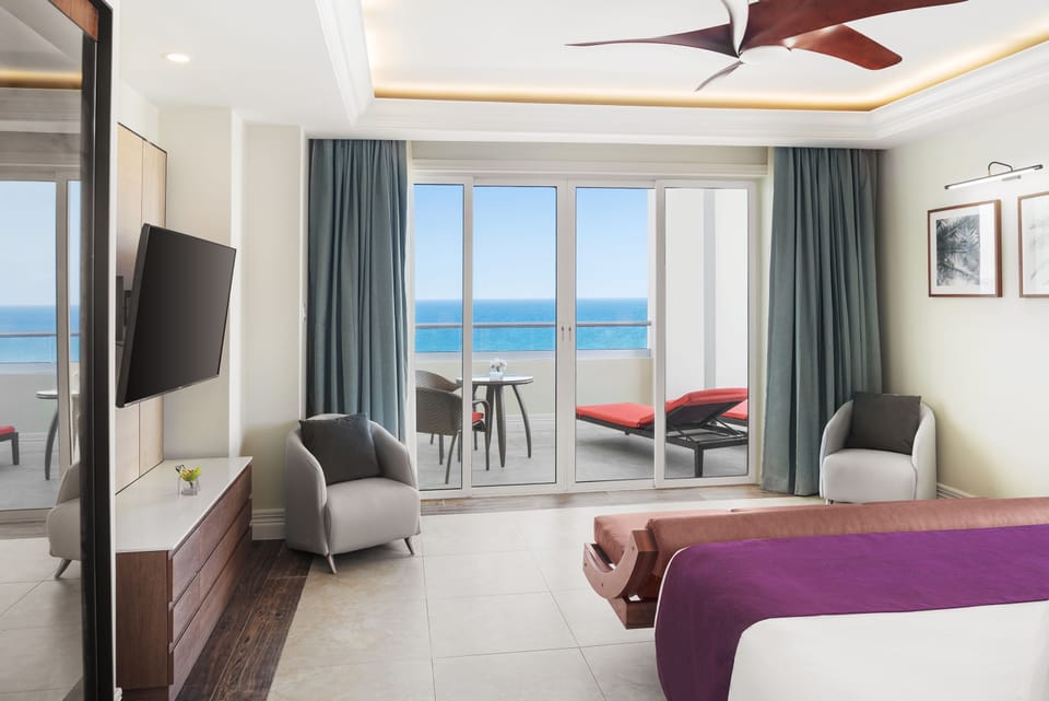 Grand Suite, 1 Bedroom, Oceanfront | Premium bedding, minibar, in-room safe, blackout drapes