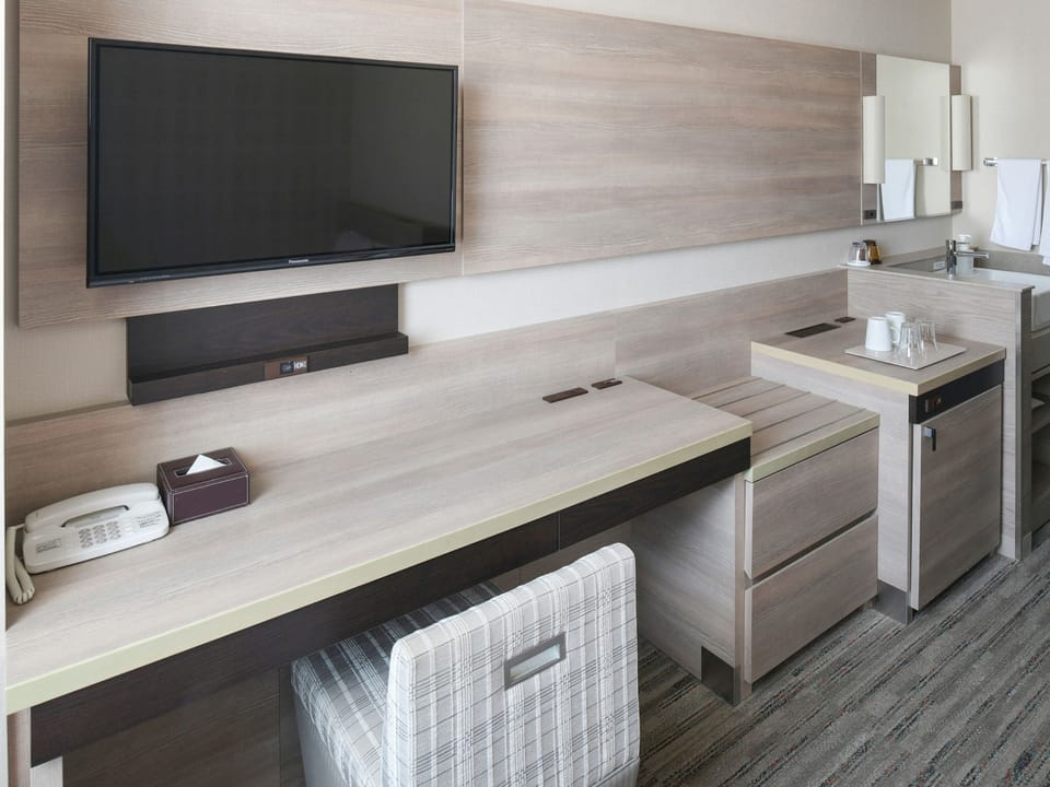 Desk, blackout drapes, iron/ironing board, free WiFi