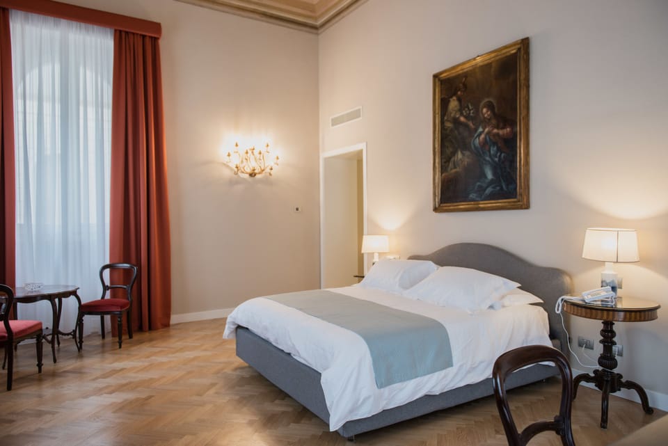 Premium bedding, down comforters, pillowtop beds, minibar
