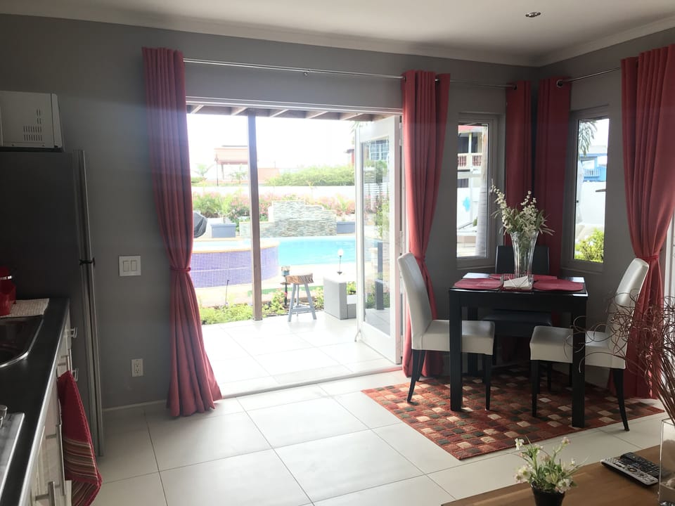 Apartment, 1 Bedroom, Pool View | Living area | TV, Netflix, DVD player
