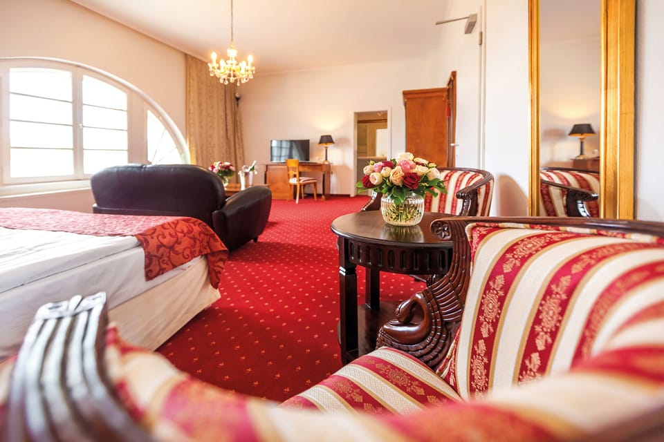 Junior Suite, 1 Queen Bed, Non Smoking | Individually decorated, desk, laptop workspace, blackout drapes