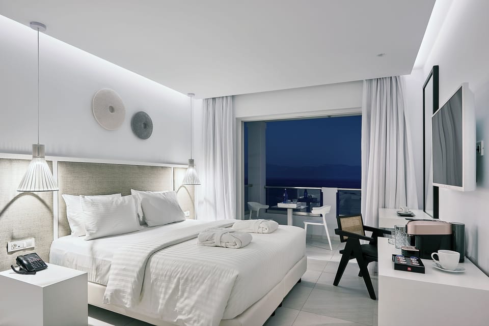 Premium Suite, Garden View (Junior) | Premium bedding, in-room safe, blackout drapes, soundproofing
