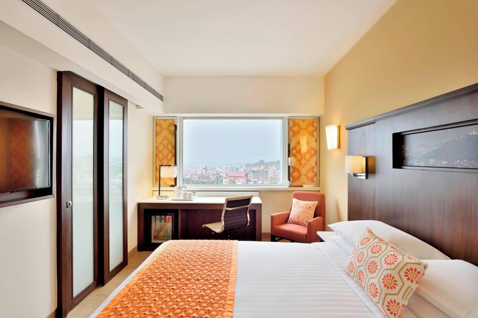 Room, 1 Queen Bed | Minibar, in-room safe, individually decorated, individually furnished