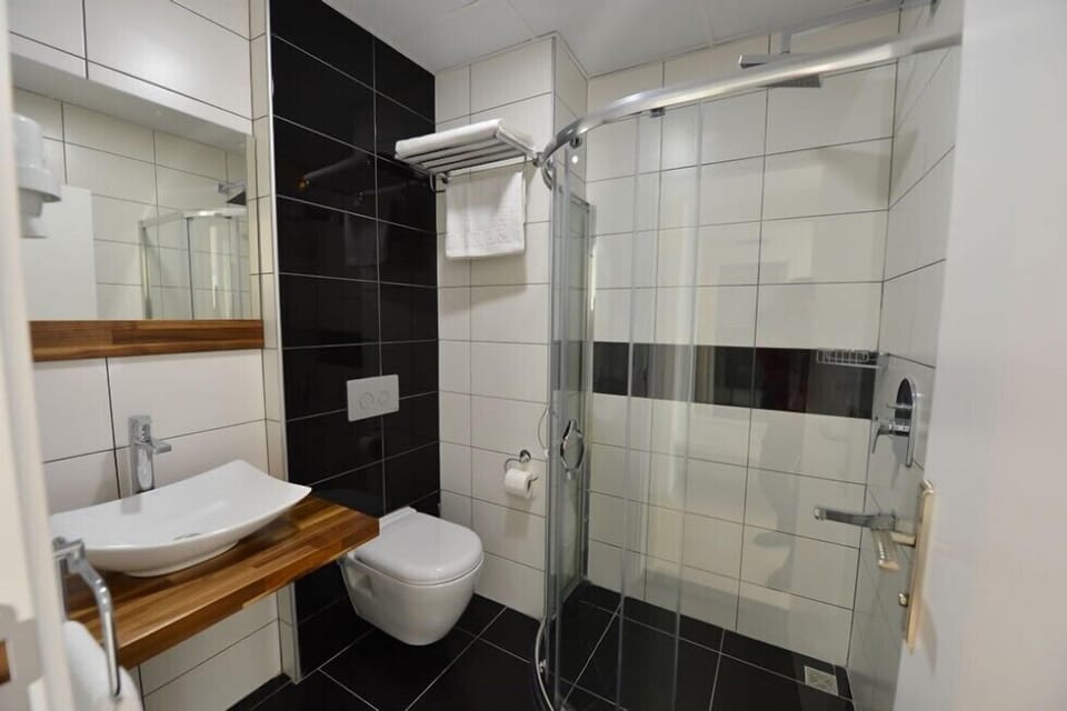 Shower, free toiletries, hair dryer, bathrobes