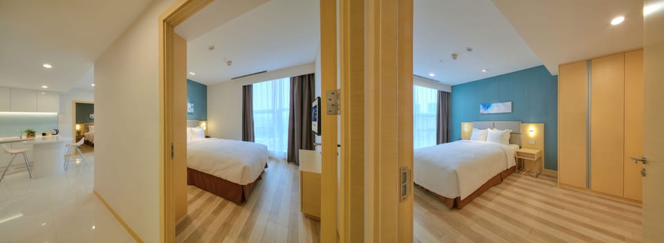 Suite, 3 Bedrooms | Minibar, in-room safe, desk, blackout drapes