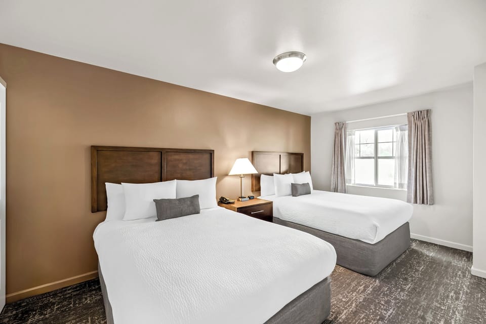 1 bedroom, premium bedding, down comforters, pillowtop beds