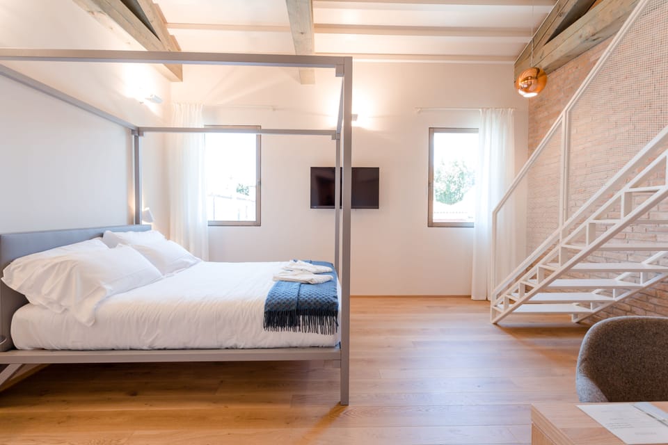Hypo-allergenic bedding available, down comforters, in-room safe, desk