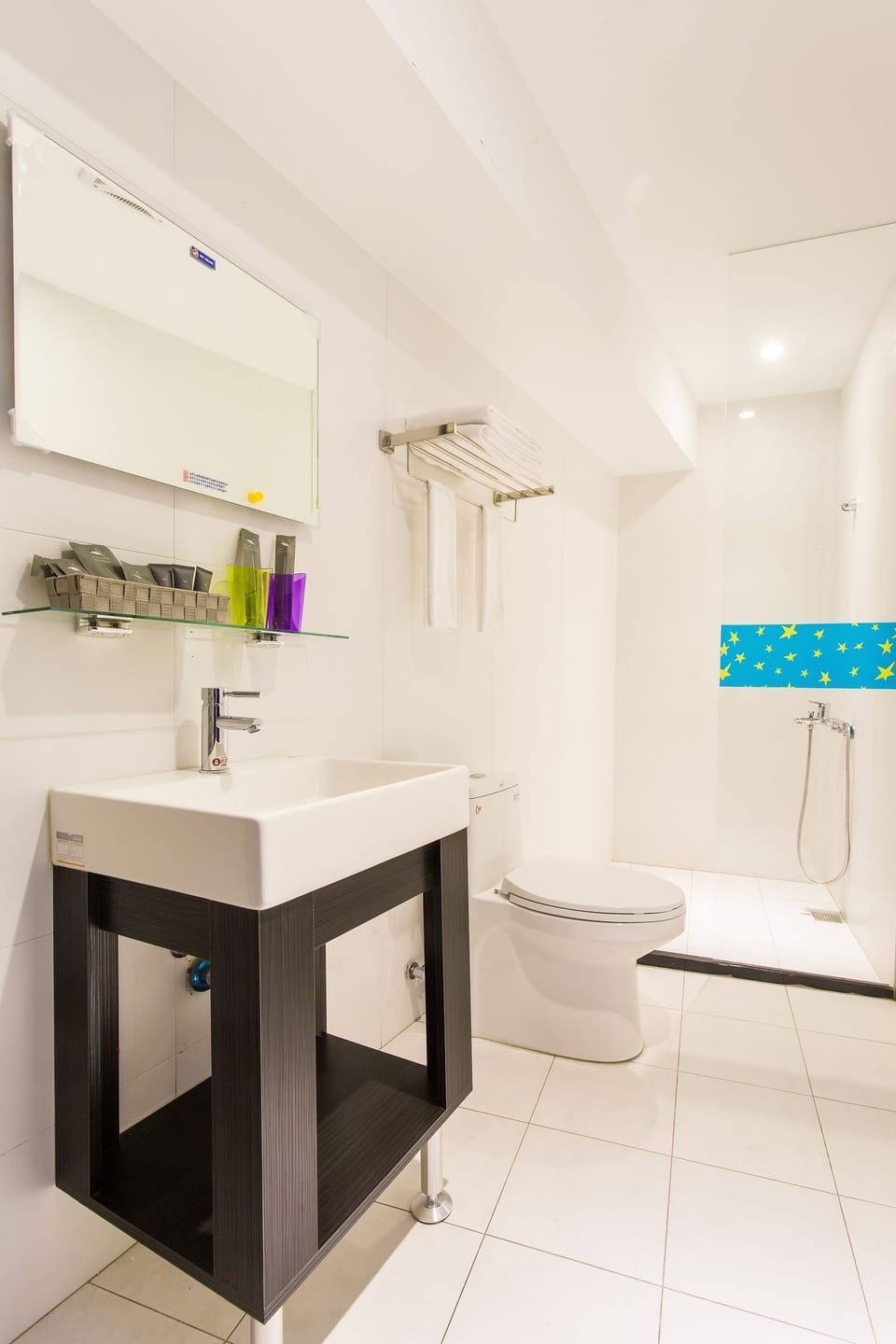Shower, free toiletries, hair dryer, slippers