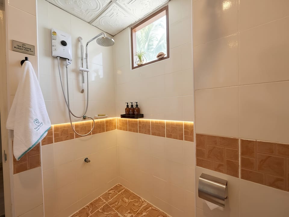 Shower, bidet, towels, soap