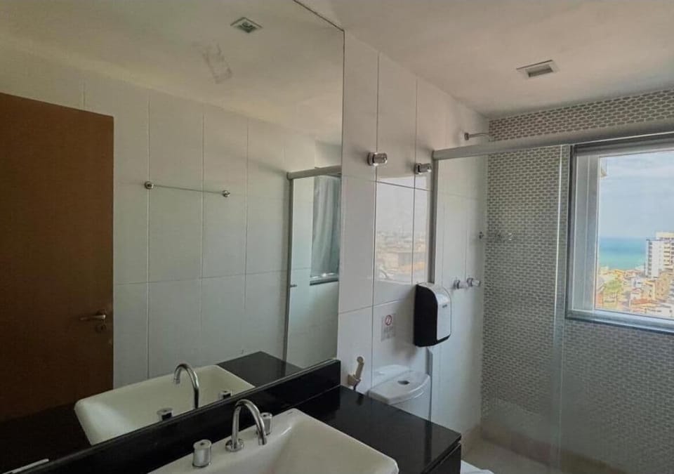 Shower, designer toiletries, hair dryer, towels