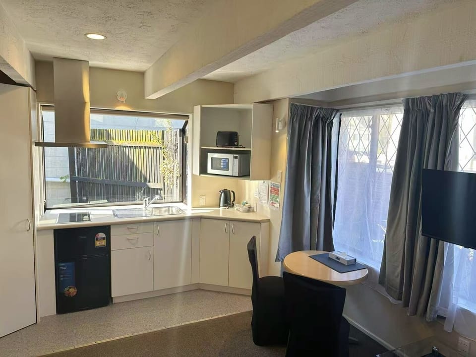 One Bedroom Downstairs Spa Unit | Desk, blackout drapes, iron/ironing board, WiFi (free)