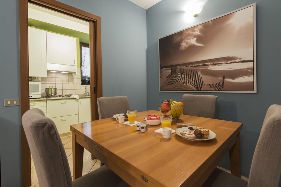 Apartment, 1 Bedroom | Living area | 26-inch TV with digital channels