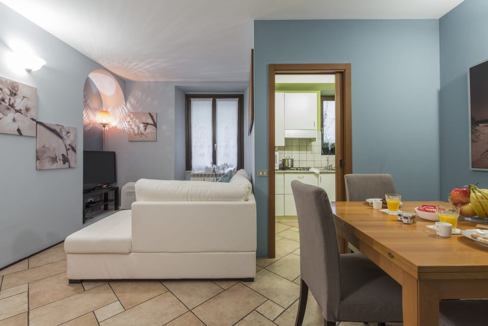 Apartment, 1 Bedroom | Living area | 26-inch TV with digital channels