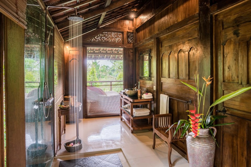 Shower, rainfall showerhead, designer toiletries, hair dryer