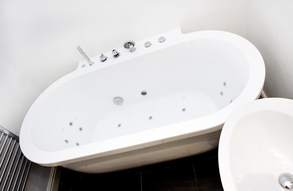 Shower, free toiletries, hair dryer, bathrobes