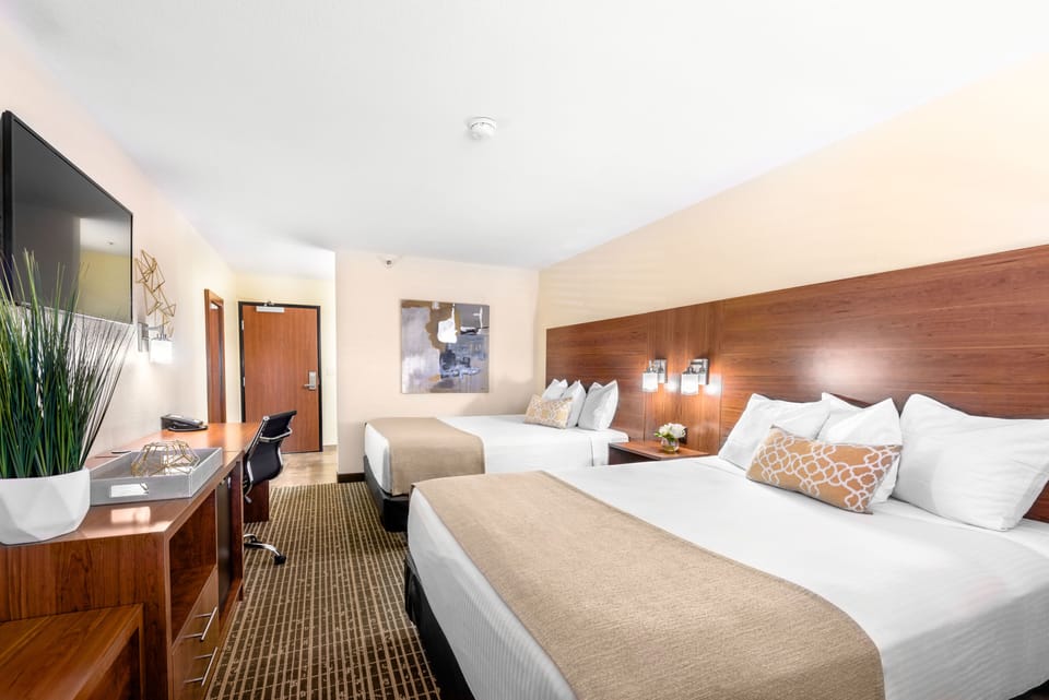 Standard Room, 2 Queen Beds | Pillowtop beds, in-room safe, desk, laptop workspace