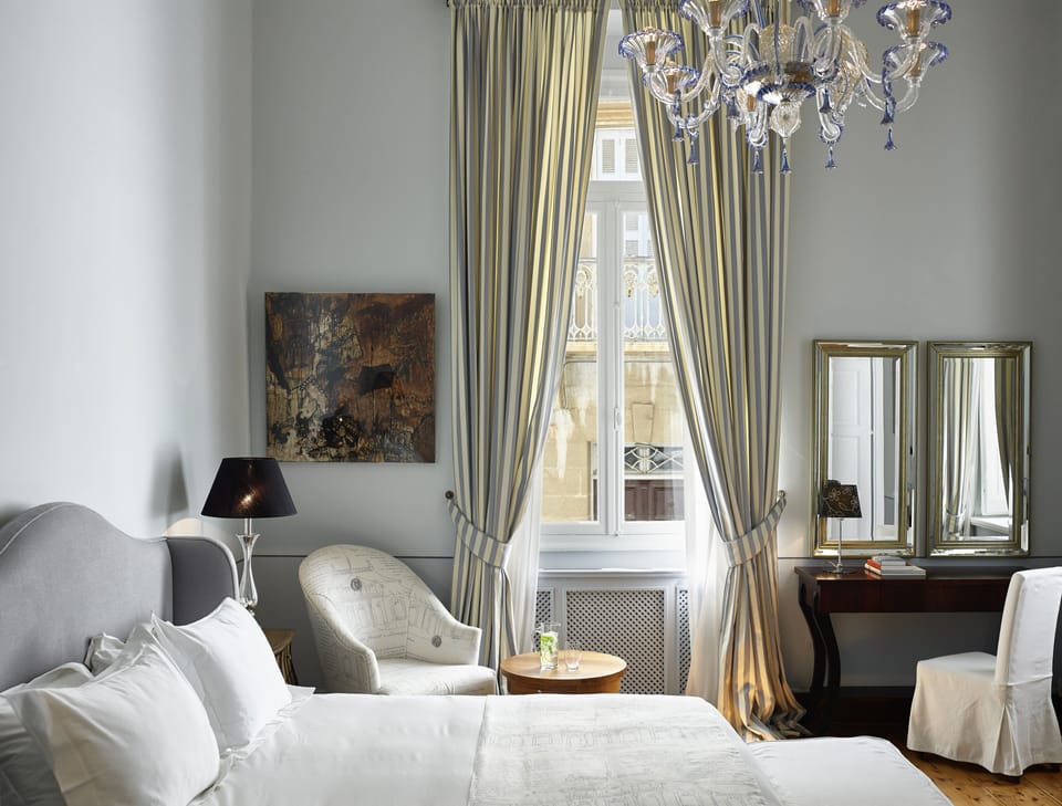 Deluxe Double or Twin Room, City View | Minibar, in-room safe, individually decorated, individually furnished
