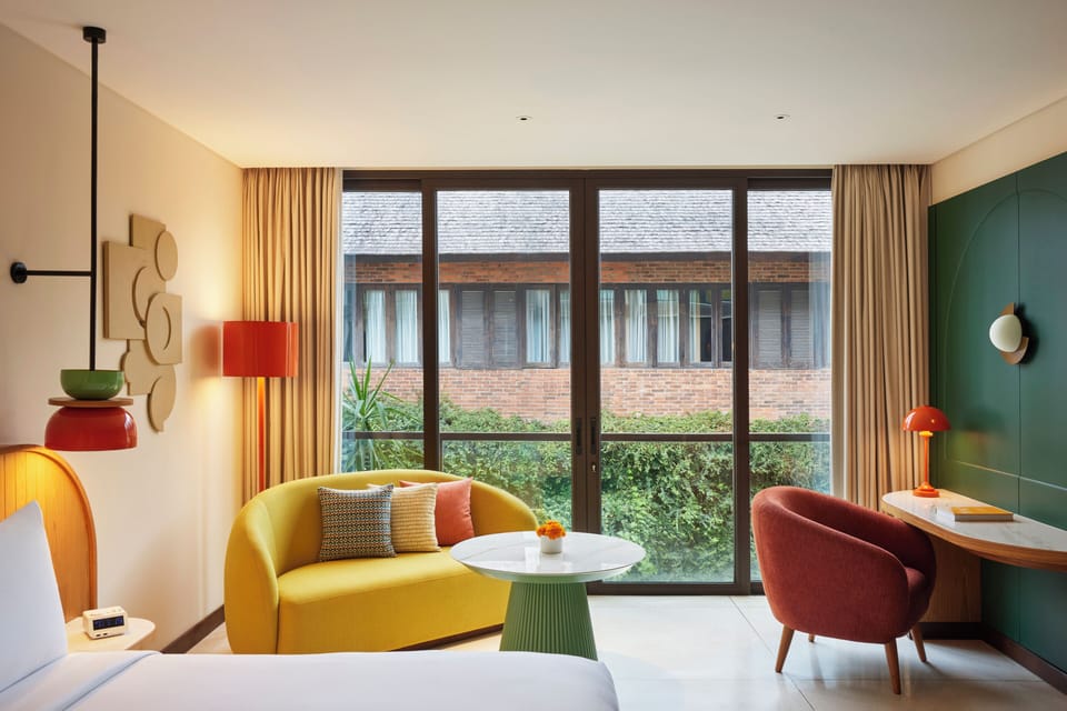 Room, 1 King Bed (Street View) | Minibar, in-room safe, desk, laptop workspace