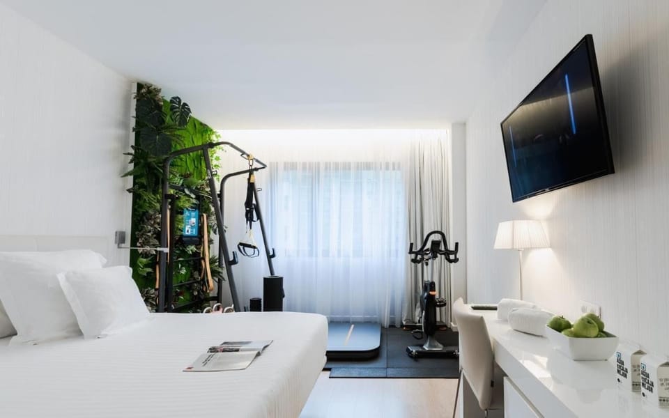 Fitness Room | Down comforters, minibar, in-room safe, desk