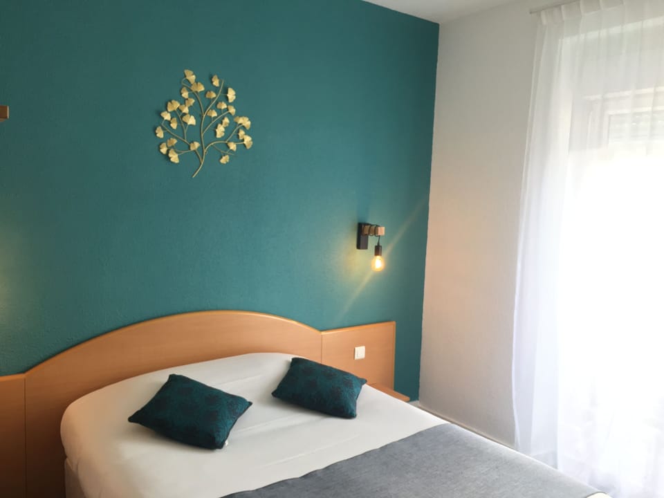 Standard Double Room, 1 Double Bed | Premium bedding, individually decorated, desk, blackout drapes