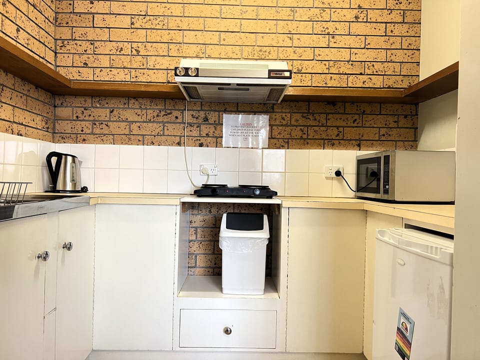 Family Room Self Catering | Private kitchen | Mini-fridge, microwave, coffee/tea maker, electric kettle
