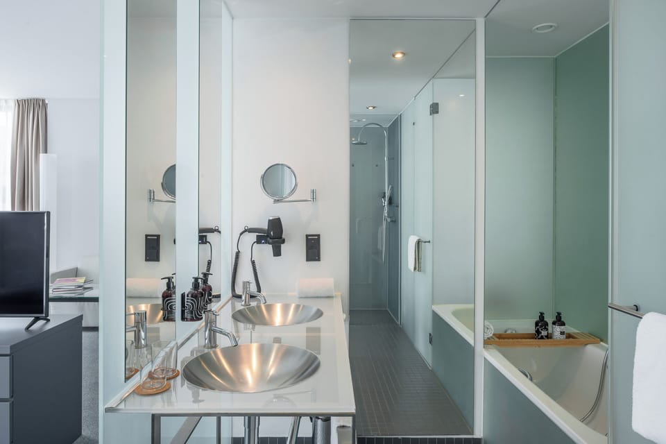 Hair dryer, towels, soap, shampoo