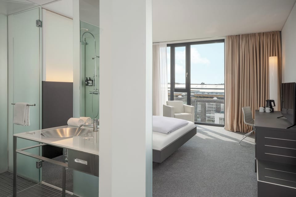 The Innside Room | Premium bedding, down comforters, Select Comfort beds, minibar