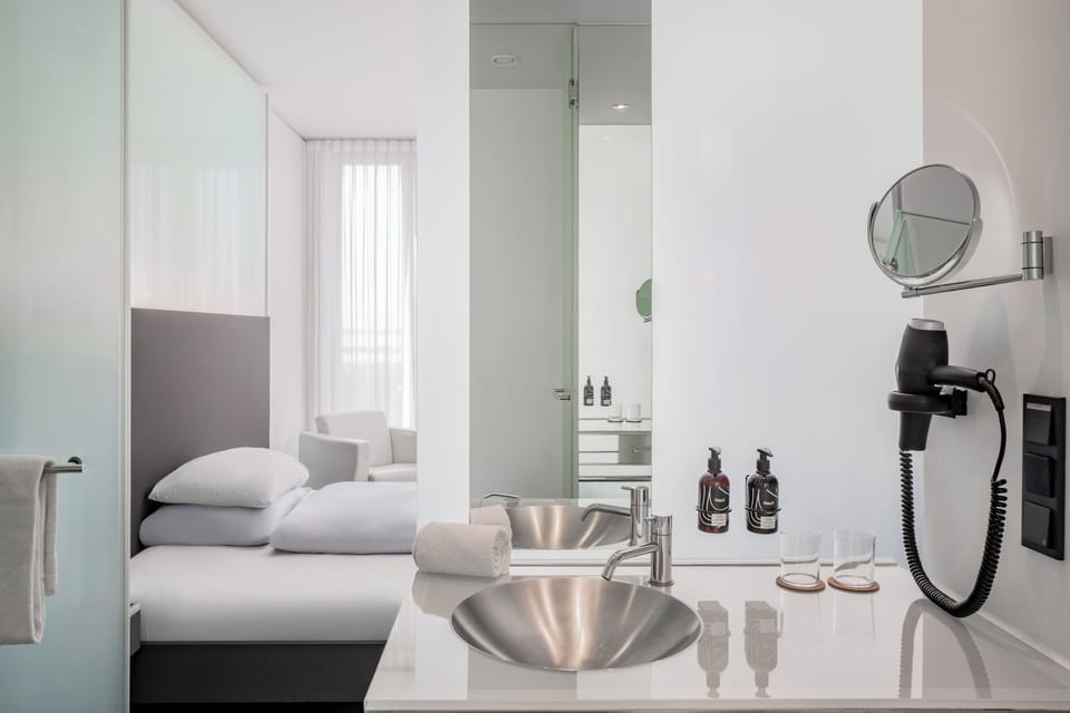 The Innside Room | Bathroom | Hair dryer, towels, soap, shampoo