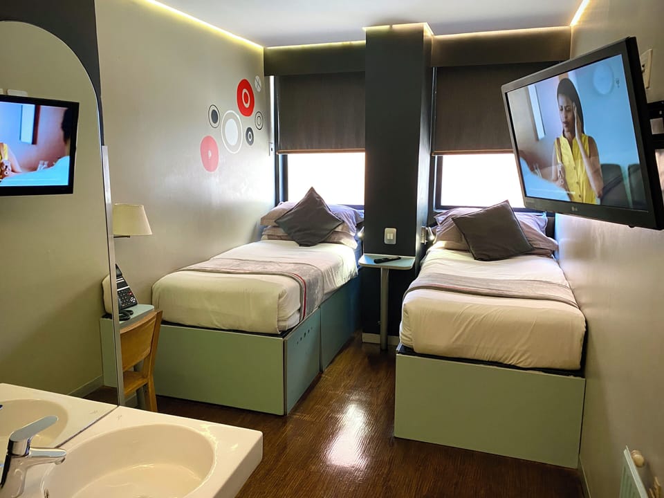 En-suite Room Twin Bed | In-room safe, desk, free WiFi, bed sheets