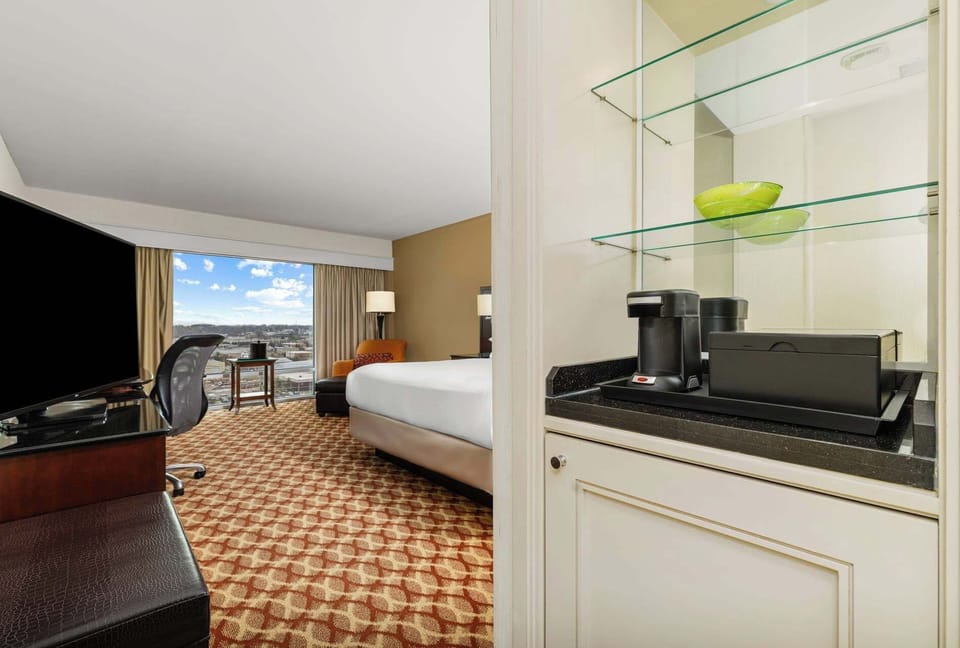 Premium bedding, down comforters, in-room safe, desk