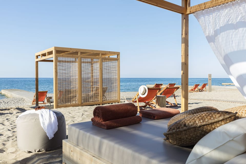On the beach, sun loungers, snorkeling, water skiing