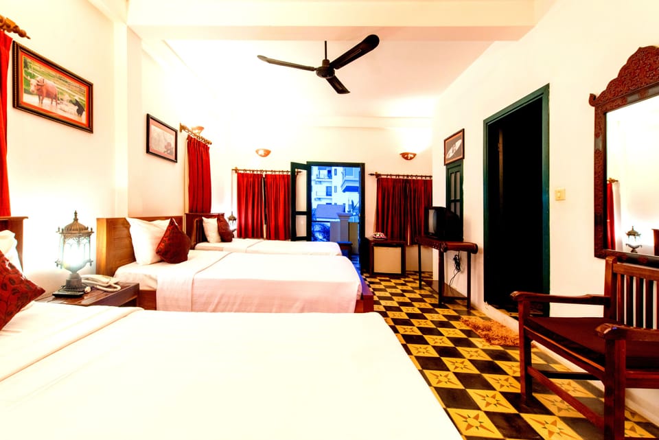 Superior Triple Room, 1 Bedroom, Garden View, Garden Area | In-room safe, individually decorated, individually furnished, desk