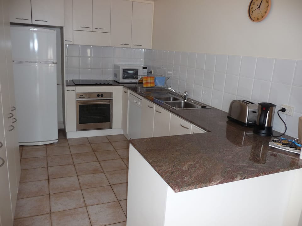 3 Bedroom 2 Bathroom Self Contained Apartment | Private kitchen | Full-size fridge, microwave, oven, stovetop