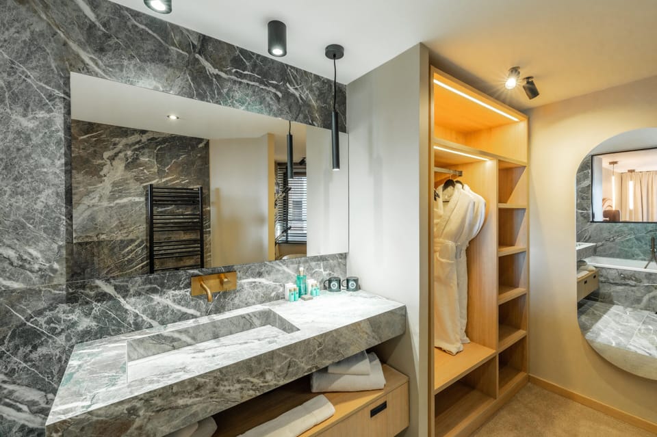Junior Suite with Balcony | Bathroom | Designer toiletries, hair dryer, bathrobes, slippers