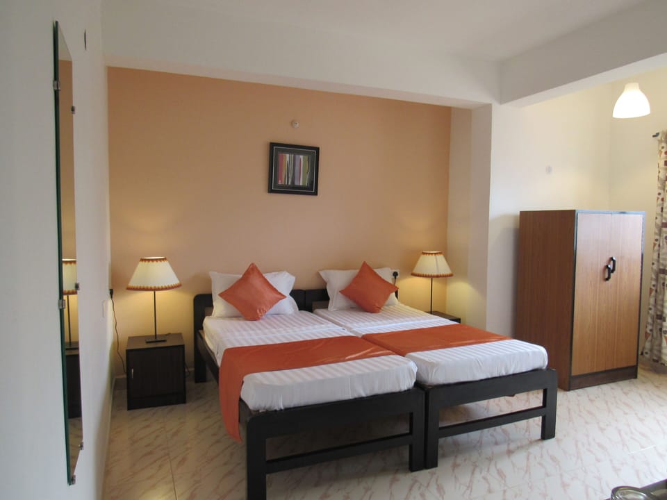 Deluxe Room AC | Egyptian cotton sheets, premium bedding, memory foam beds, desk