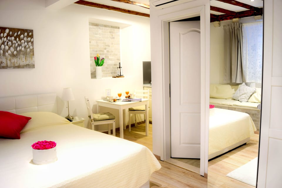 Premium bedding, memory foam beds, minibar, blackout drapes