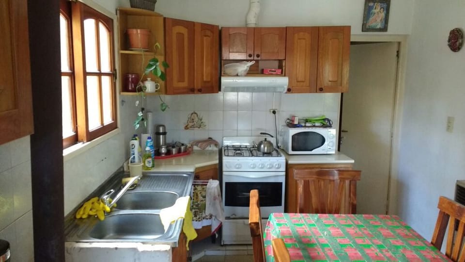 Cabin | Private kitchen | Coffee/tea maker, full-size fridge, microwave, oven
