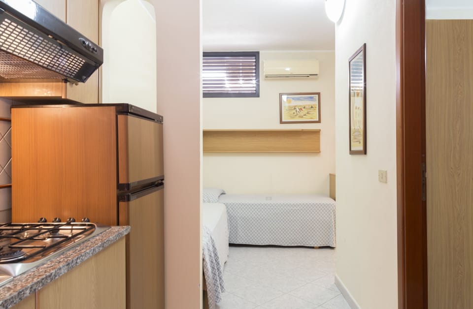 Standard Apartment, 1 Bedroom | Premium bedding, down comforters, pillowtop beds, in-room safe